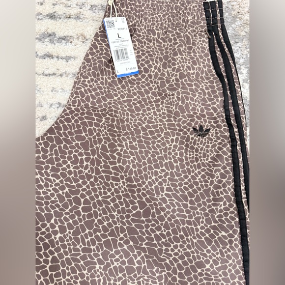 adidas Women’s FIREBIRD OVERSIZED AOP DENIM PANTS - Picture 7 of 7